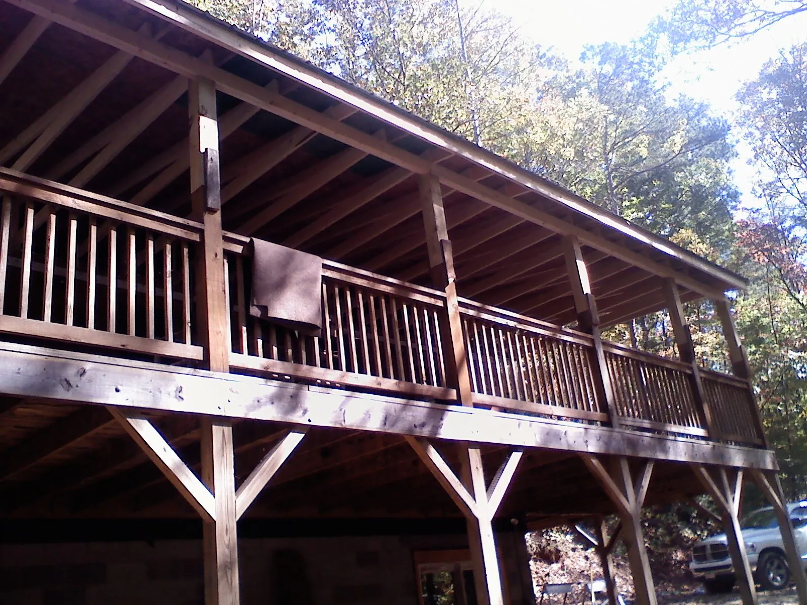 Timber framing under a new elevated porch and deck — Roof Leak Repair in Pikesville by Roofing Brothers